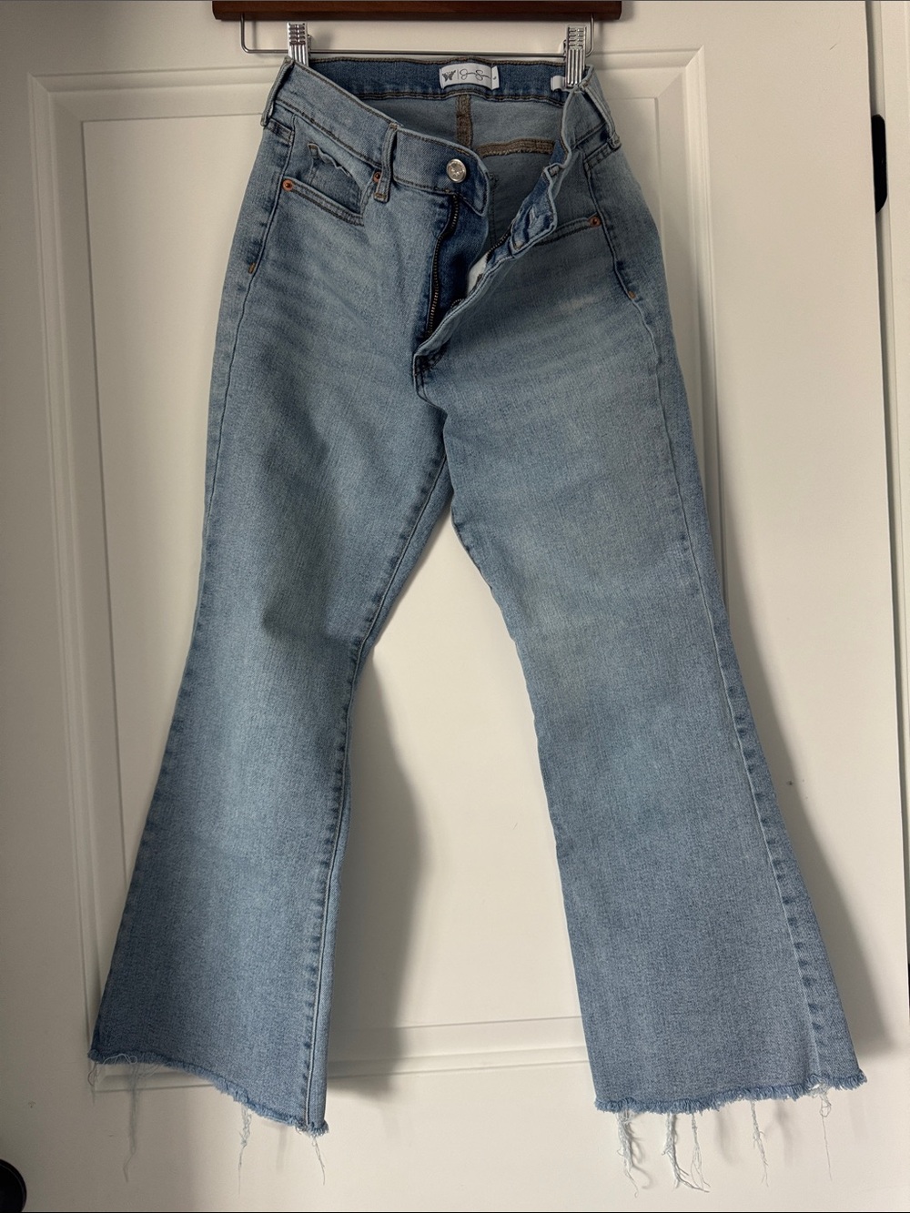 Jessica Simpson Light Blue High-Rise Flare Jeans with Raw Hem
